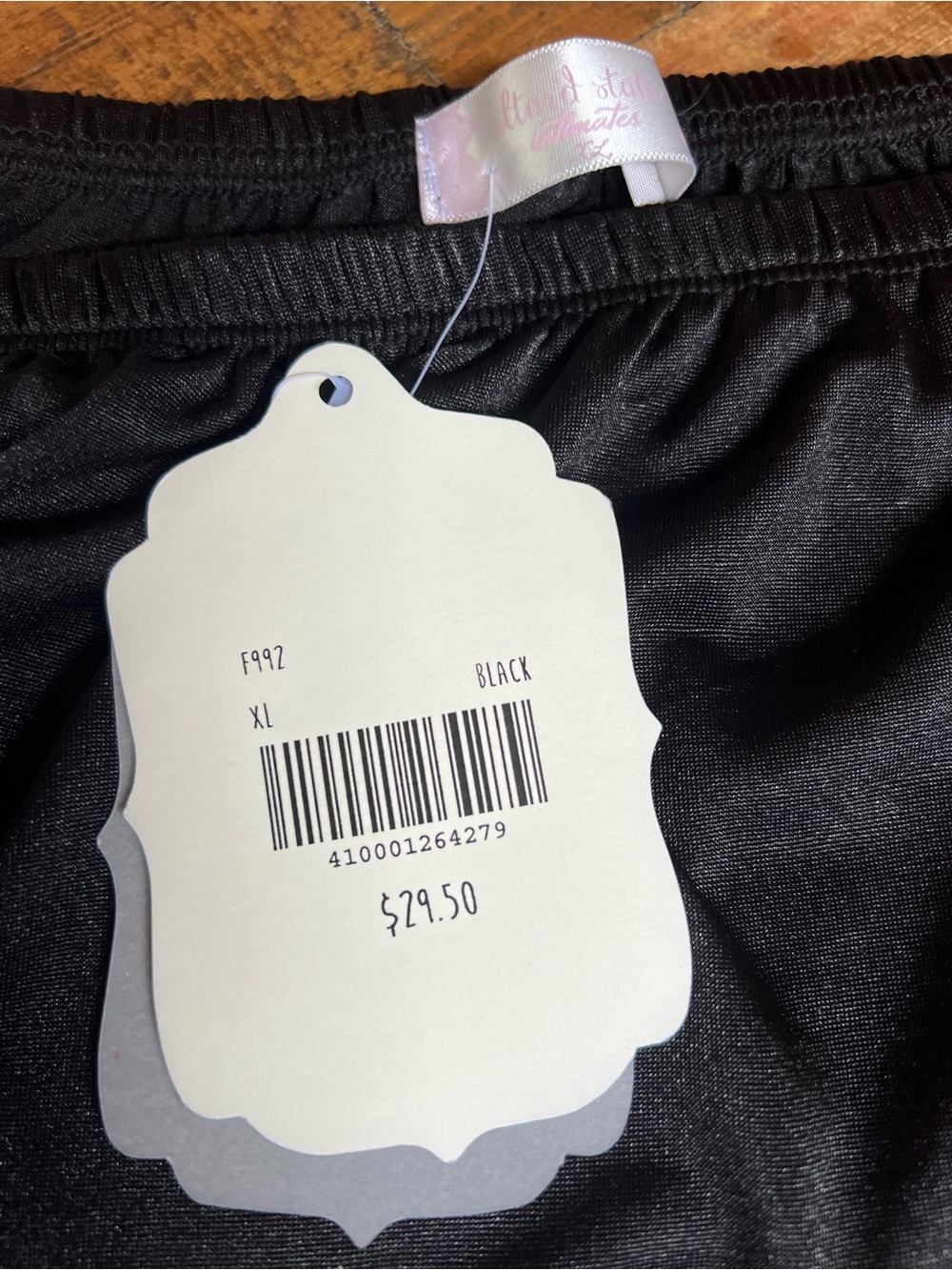 Black silk slip with lace trim.  New with tags XL